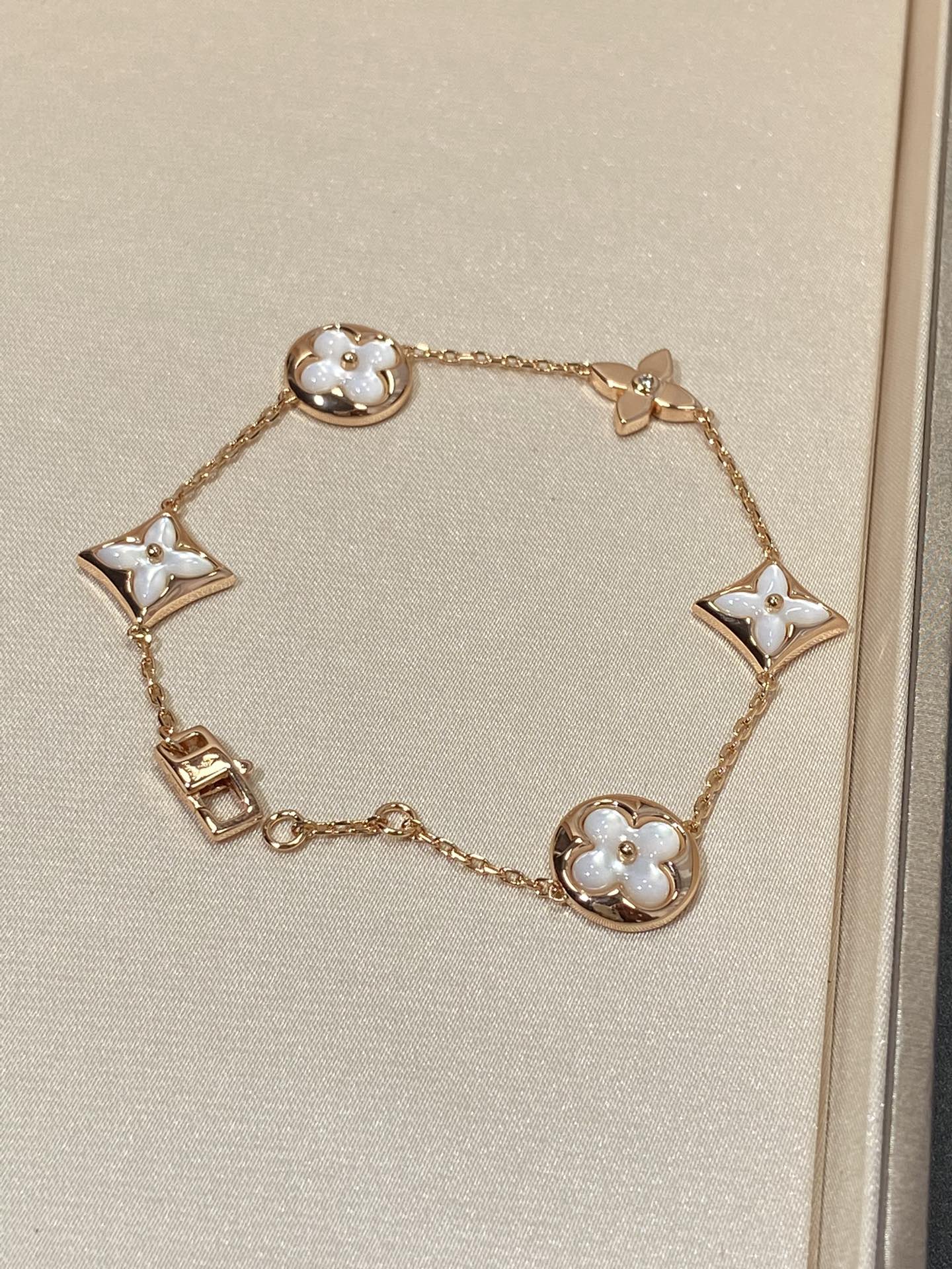 [Lucas Jewelry]STAR AND SUN 5 MOTIF MOP PINK GOLD BRACELET