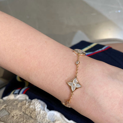 [Lucas Jewelry]STAR AND SUN 4 MOTIF WHITE MOP PINK GOLD BRACELET